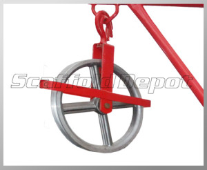 A red pulley wheel on a hanger.